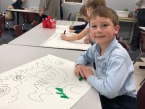 Student with Paul Klee inspired drawing