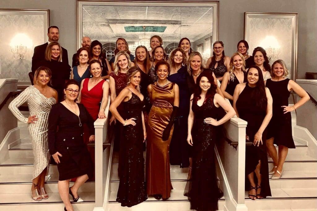 Photo of staff and attendees of the 2023 Ivywood Classical Academy Gala
