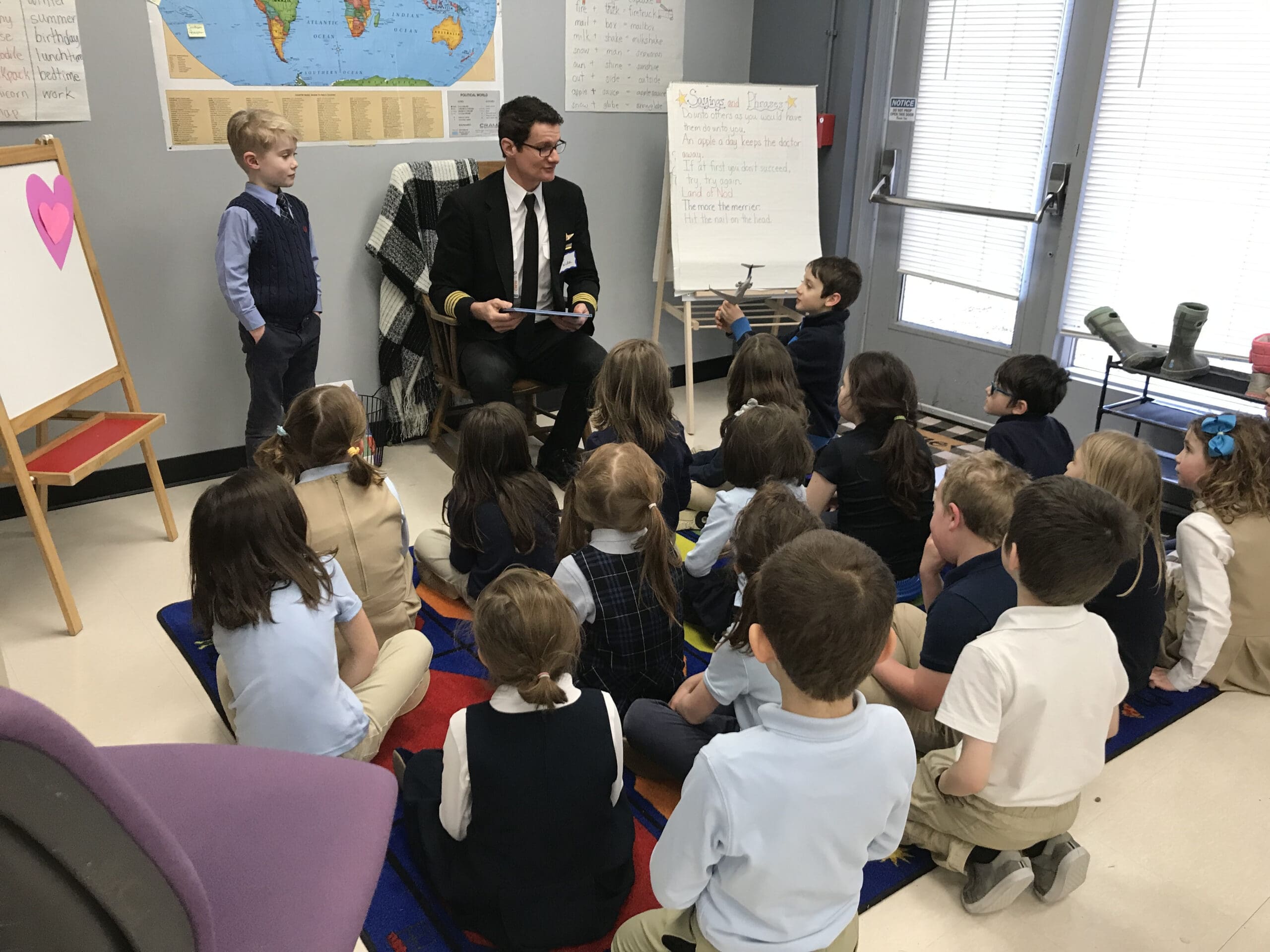 Delta Airlines pilot reading for 1st grade class