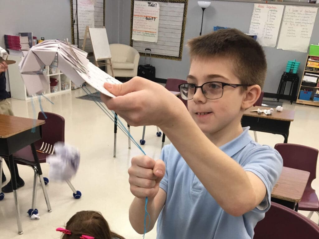 Student working on hand model