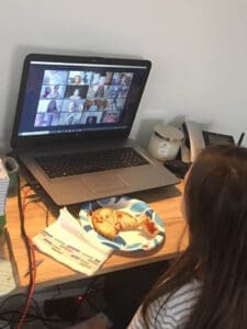 Student meeting with class over Zoom